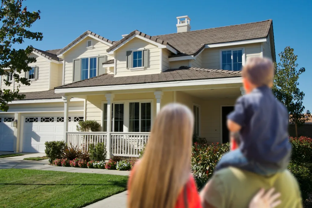 Homeowners looking at remodeled home