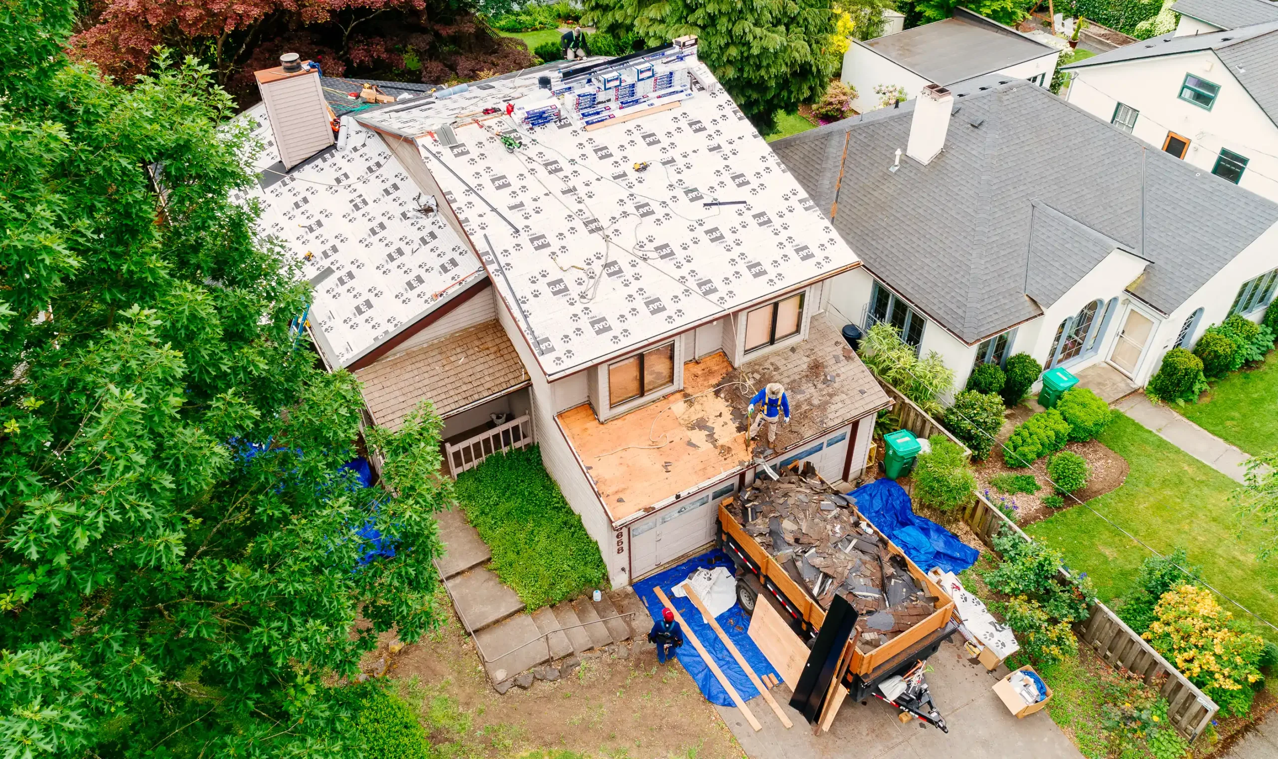 GAF Tiger Paw™ underlayment being installed on a Roof during a roof replacement.