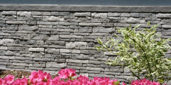 Tando Stone Siding in Glacier Bay with flowers in front
