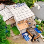 GAF Tiger Paw™ underlayment being installed on a Roof during a roof replacement.