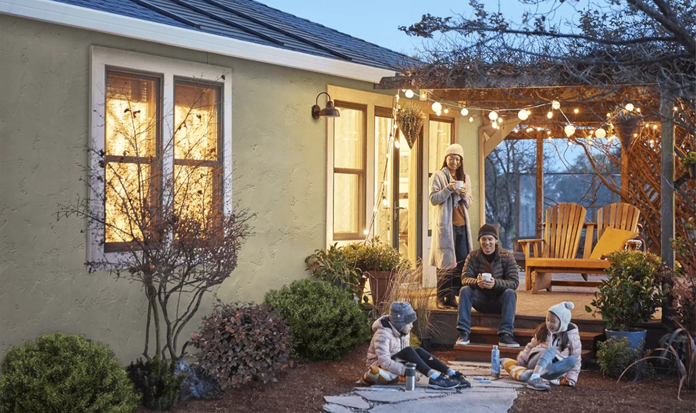 Family in Backyard, Highlighting GAF Solar Shingles