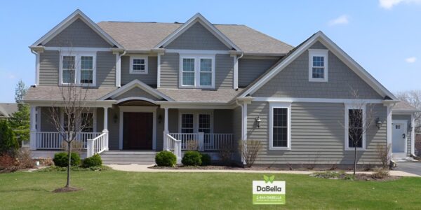 Siding Replacement done by DaBella in James Hardie Fiber Cement in the color Gray with white trim