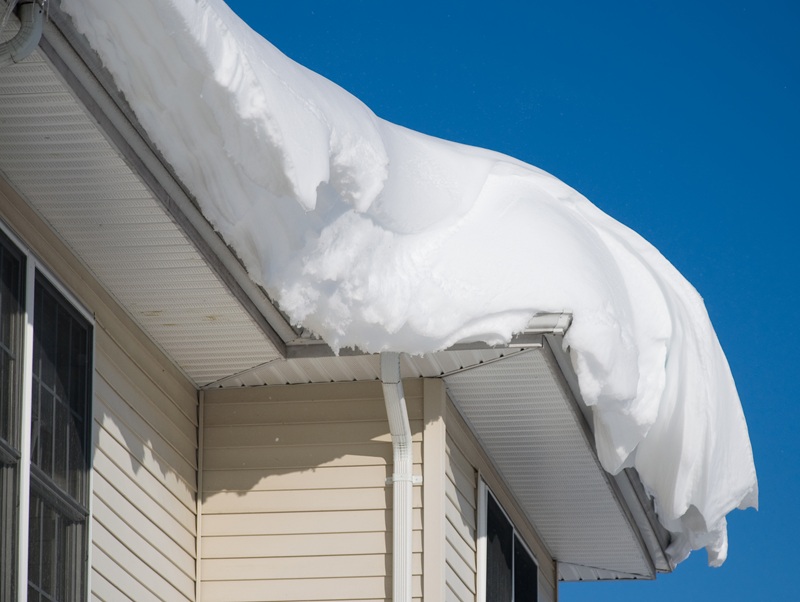 Snow on top of a roof