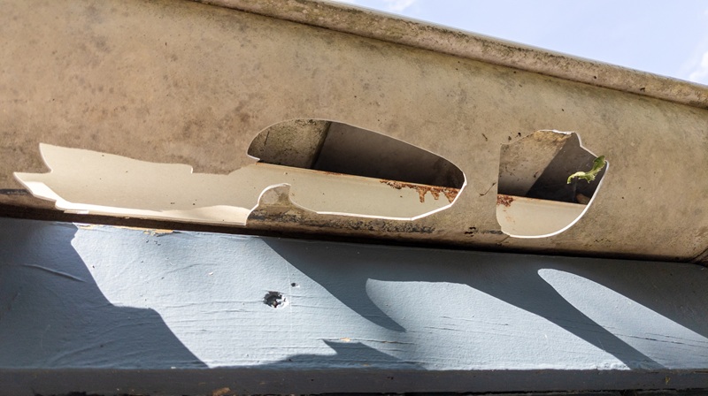 Damaged gutters that need to be replaced.